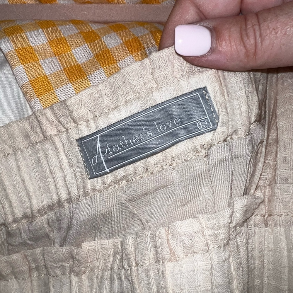 A father’s love cream dress. NWT.